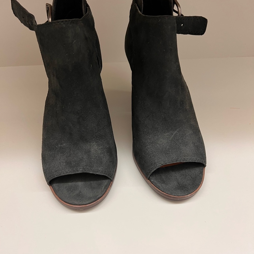 Ankle peep toe booties.